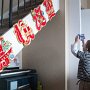 Daniel taking pictures of our Chinese Christmas decorations.